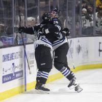 Wenatchee Wild's Conor Geekie and Kenta Isogai celebrate win