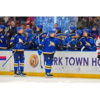 Saskatoon Blades' Easton Armstrong and Yegor Sidorov congratulate team