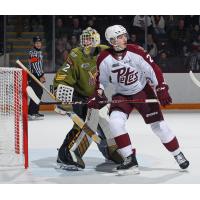 North Bay Battalion's Charlie Robertson and Peterborough Petes' Ryder McIntyre on the ice