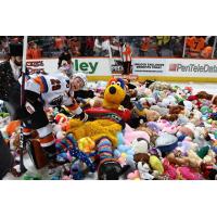 Lehigh Valley Phantoms' Wyatte Wylie and mascot meLVin on Teddy Bear Toss night