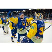 Saskatoon Blades celebrate their win over the Calgary Hitmen