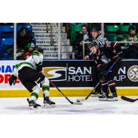 Red Deer Rebels centre Evan Smith (right)