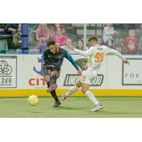 St. Louis Ambush's Christian Briggs and Tacoma Stars' Sebastian Navarro in action