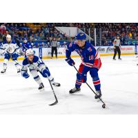 Kitchener Rangers centre Carson Rehkopf with the puck against the Sudbury Wolves