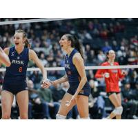 Marin Grote (left) and Emiliya Dimitrova of the Grand Rapids Rise react after a big point against the Atlanta Vibe