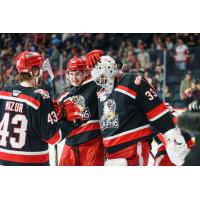 Grand Rapids Griffins' Sebastian Cossa and Carter Mazur celebrate win