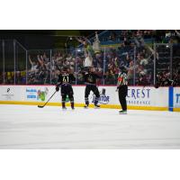 Tucson Roadrunners' Austin Poganski and Montana Onyebuchi celebrate win