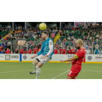 St. Louis Ambush head the ball against the Kansas City Comets