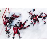 Kelowna Rockets battle for a goal against the Vancouver Giants