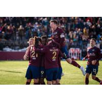 Detroit City FC celebrates a goal against Loudoun United