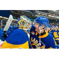 Saskatoon Blades' Evan Gardner and Brandon Lisowsky celebrate win