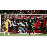 Phoenix Rising FC goalkeeper Rocco Rios Novo makes a stop