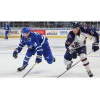 Wichita Thunder forward Jason Pineo (left) vs. the Tulsa Oilers