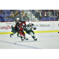 Vancouver Giants' Jaden Lipinski versus Everett Silvertips' Caden Brown and Austin Roest