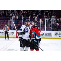 Wenatchee Wild's Graham Sward and Kelowna Rockets' Michael Cicek on game night