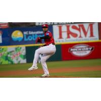 Hickory Crawdads' Winston Santos in action