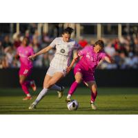 Savannah McCaskill of San Diego Wave FC (right) vs. Racing Louisville