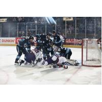 Youngstown Phantoms fight for a loose puck vs. the Madison Capitols