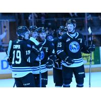 Wenatchee Wild forward Briley Wood (right, 15) and Graham Sward (center, 44)