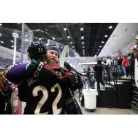 Tucson Roadrunners exchange hugs after a victory