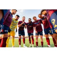 Detroit City FC huddle before facing Oakland Roots SC