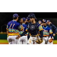 Montgomery Biscuits' Kevin Piper congratulates Heriberto Hernandez