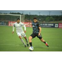 Greenville Triumph SC's Daniel Wu battles South Georgia Tormenta FC's Preston Kilwien