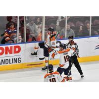 Greenville Swamp Rabbits forwards Quinn Olson and Colton Young and defenseman Max Martin