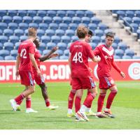 Chicago Fire FC II exhanges congratulations following a goal