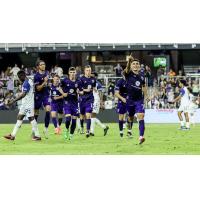 Louisville City FC forward Ray Serrano (right)