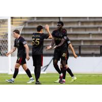 Atlanta United 2's Matías Gallardo congratulates Noble Okello