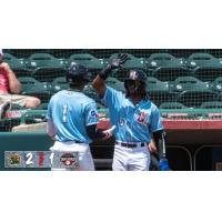 Hickory Crawdads designated hitter Sebastian Walcott (left) and outfielder Yosy Galan