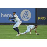 Tri-City Dust Devils left fielder Werner Blakely (standing) and shortstop Caleb Ketchup