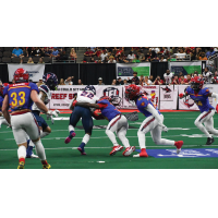 Jacksonville Sharks make a tackle against the Sioux Falls Storm