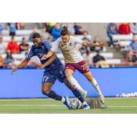 Detroit City FC midfielder Maxi Rodriguez (right) vs. Indy Eleven