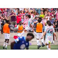 Atlético Ottawa and Alberto Zapater celebrate his game-tying goal