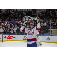 Saginaw Spirit defenseman Braden Haché hoists the Memorial Cup