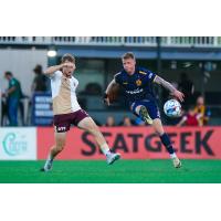 Rhode Island FC and Detroit City FC in action