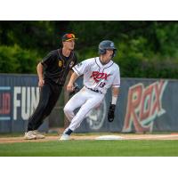 Willmar Stingers' Aidan Byrne and St. Cloud Rox' Luke Doty on game night