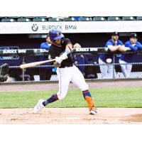 Rylan Bannon of the Syracuse Mets eyes a pitch