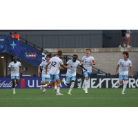 Chicago Fire FC II's Diego Konincks congratulates team