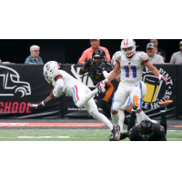 Northern Arizona Wranglers carry the ball against the Arizona Rattlers