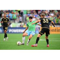 Seattle Sounders FC's Obed Vargas battles LAFC's Aaron Long