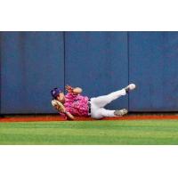 Pensacola Blue Wahoos make a catch in the outfield