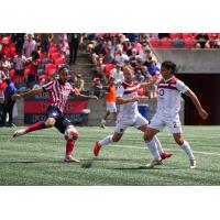 Atlético Ottawa forward Rubén del Campo (left)