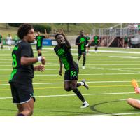 Lexington SC forward Ates Diouf (32)