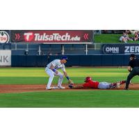 Tulsa Drillers' Alex Freeland and Springfield Cardinals' Jeremy Rivas in action