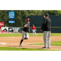 Justin Connell of the Sioux City Explorers rounds third after homering