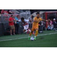 Rhode Island FC's Wesley Leggett versus Loudoun United FC's Noah Fuson