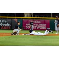 Chandler Simpson of the Montgomery Biscuits steals second